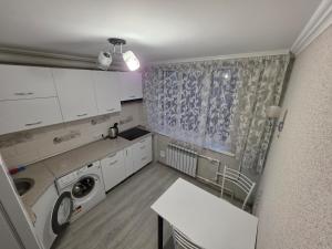 Kuchyň nebo kuchyňský kout v ubytování Buiucani + 6 fotografií