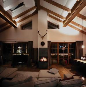 Posezení v ubytování Sonnberg Chalet - Entspannung pur im Luxus Chalet mit Whirlpool-Sauna