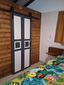 Postel nebo postele na pokoji v ubytování Maisonnette Ti Édèn