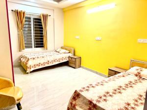 Giường trong phòng chung tại Brookefield Suites Premium Rooms- Brookefield- AECS Layout