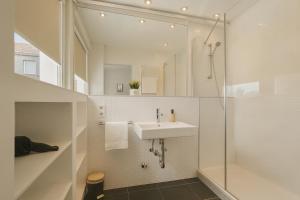 Ванная комната в Old Town Apartments +65 фотографий