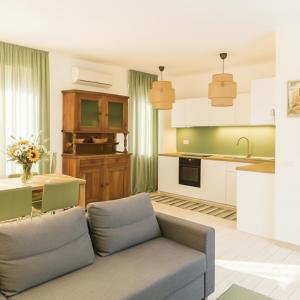 Η κουζίνα ή μικρή κουζίνα στο Madau's House Apartments & Suites