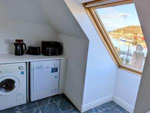 Køkken eller tekøkken på Littlebay Penthouse