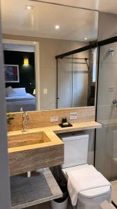 Ένα μπάνιο στο Pousada Canto do Camburi