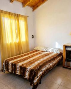 Giường trong phòng chung tại Casa Cafa