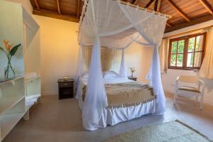 Ένα ή περισσότερα κρεβάτια σε δωμάτιο στο La hospedaria +27 φωτογραφίες