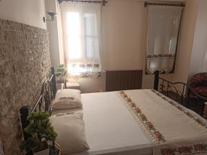 Ένα ή περισσότερα κρεβάτια σε δωμάτιο στο İkiz Konaklar +5 φωτογραφίες