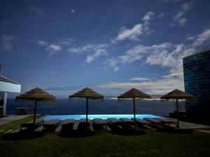 Bazén v ubytování João de Oliveira casas de campo nebo v jeho okolí