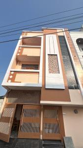 a building with a window on the side of it at Ahmed's Guest House in Hyderabad