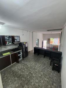 Kuchyň nebo kuchyňský kout v ubytování Apartamento Acogedor - San Luis, Ant - Shelter La Perla Hostal