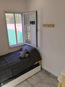 Postel nebo postele na pokoji v ubytování Altos Verdes Necochea