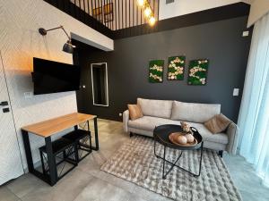 TV a/nebo společenská místnost v ubytování Green Hills