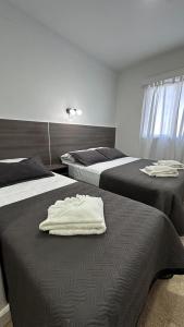 Ένα ή περισσότερα κρεβάτια σε δωμάτιο στο New Araucano