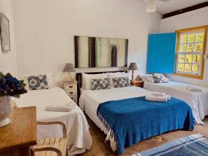 Postel nebo postele na pokoji v ubytování Pouso do Bichinho 2