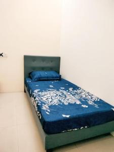 Postel nebo postele na pokoji v ubytování Me HOMESTAY Kuala Ibai, Kuala Terengganu