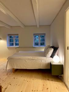 Ένα ή περισσότερα κρεβάτια σε δωμάτιο στο Davinde Bed & Breakfast