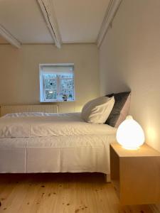 Ένα ή περισσότερα κρεβάτια σε δωμάτιο στο Davinde Bed & Breakfast +9 φωτογραφίες