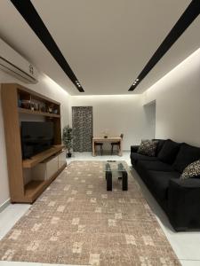 Posezení v ubytování Abu Rakan Apartment