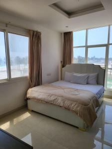 Postel nebo postele na pokoji v ubytování SeaViewApartment