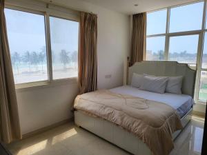 Postel nebo postele na pokoji v ubytování SeaViewApartment