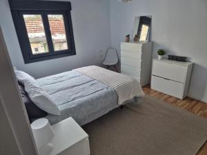 En eller flere senge i et værelse på Villa caracol + 4 billeder