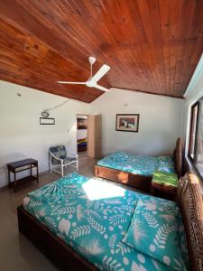 Postel nebo postele na pokoji v ubytování Cabaña - Condominio El Rincón del Edén + 46 fotografií