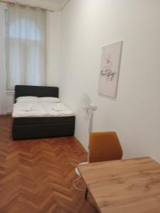 Ένα ή περισσότερα κρεβάτια σε δωμάτιο στο Alraei 1MH Hotel