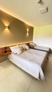 Postel nebo postele na pokoji v ubytování Hotel Catavento