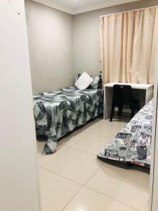 Ένα ή περισσότερα κρεβάτια σε δωμάτιο στο Entire Premises ideal for large groups and reunions