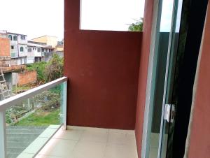 En balkon eller terrasse på Casa na Prainha de Mambucaba