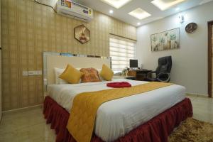 a bedroom with a large bed in a room at Changanassery in Changanācheri