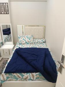 En eller flere senge i et værelse på شقة فندقية غرفة واحدة + 2 billeder