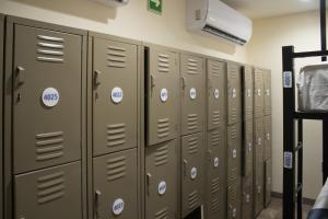 a row of lockers in a locker room at Travohostal Monterrey Historico in Monterrey +4 photos