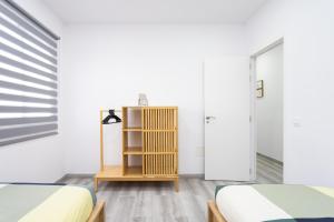 Ένα ή περισσότερα κρεβάτια σε δωμάτιο στο Casa Doña Juana - Villa de 4 dormitorios con jacuzzi y gran zona exterior +68 φωτογραφίες