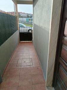 Μπαλκόνι ή βεράντα στο Cantinho Familiar a 10 minutos do Aeroporto +24 φωτογραφίες