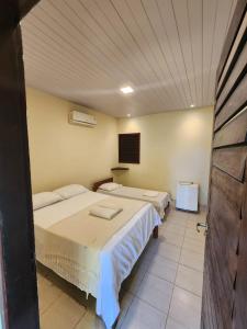 Ένα ή περισσότερα κρεβάτια σε δωμάτιο στο Pipa Villa Mar +9 φωτογραφίες