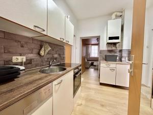 Køkken eller tekøkken på Wohnung in Steyr - mit Parkplatz & 2 Schlafzimmer