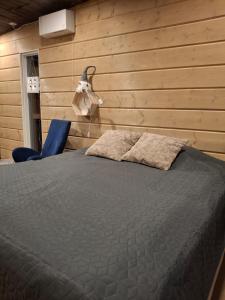 Ένα ή περισσότερα κρεβάτια σε δωμάτιο στο Arctic River View