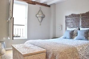 En eller flere senge i et værelse på Terraza a los pies de la Alhambra