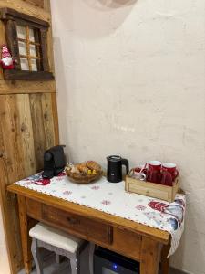 a table with a bowl of food on top of it at Lightroom in Fenis +14 photos