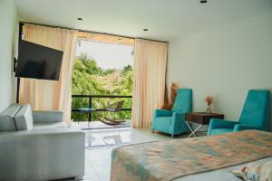 TV/trung tâm giải trí tại Hotel Terra Tacuara