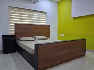 Ένα ή περισσότερα κρεβάτια σε δωμάτιο στο Splendro Holidays 4 Bedroom Private Pool Villa