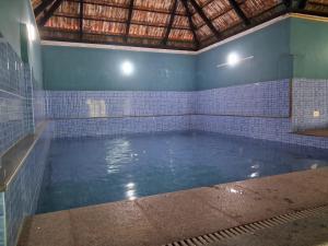 Πισίνα στο ή κοντά στο Splendro Holidays 4 Bedroom Private Pool Villa