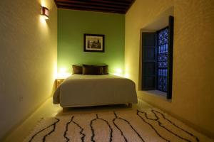 Postel nebo postele na pokoji v ubytování BKAN RIAD MARRAKECH + 4 fotografie