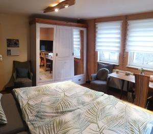 En eller flere senge i et værelse på FeWo an der Enz