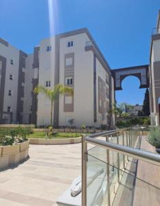 a view of a building in a city at Apartment222 2 rooms Al Bousten Hammamet in Hammamet Sud