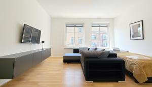 Телевизор и/или развлекательный центр в Old Town Apartments