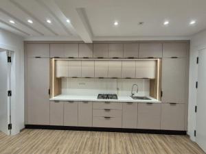 Kuchyň nebo kuchyňský kout v ubytování Skanes monastir