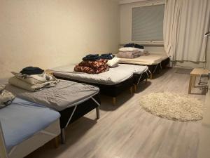 Postel nebo postele na pokoji v ubytování Matka Mystical Lapland Home