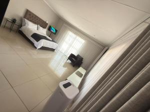 Postel nebo postele na pokoji v ubytování Latifahs Home